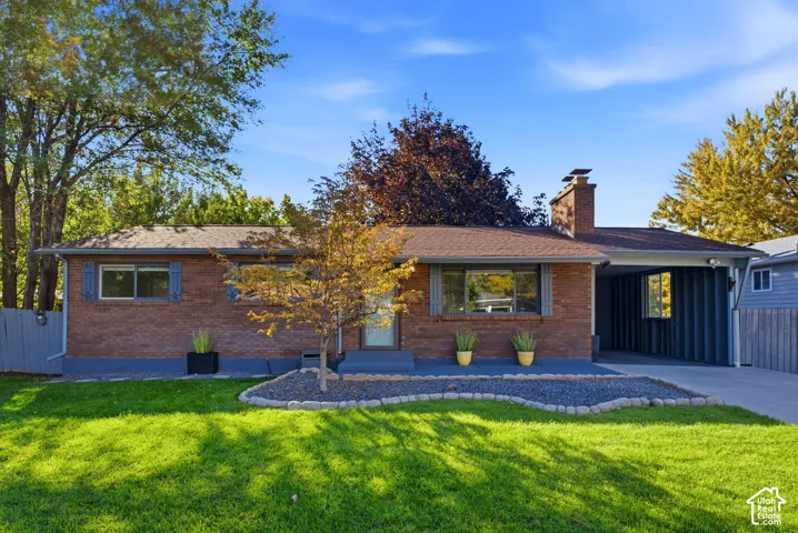 Brick exterior with blue foundation