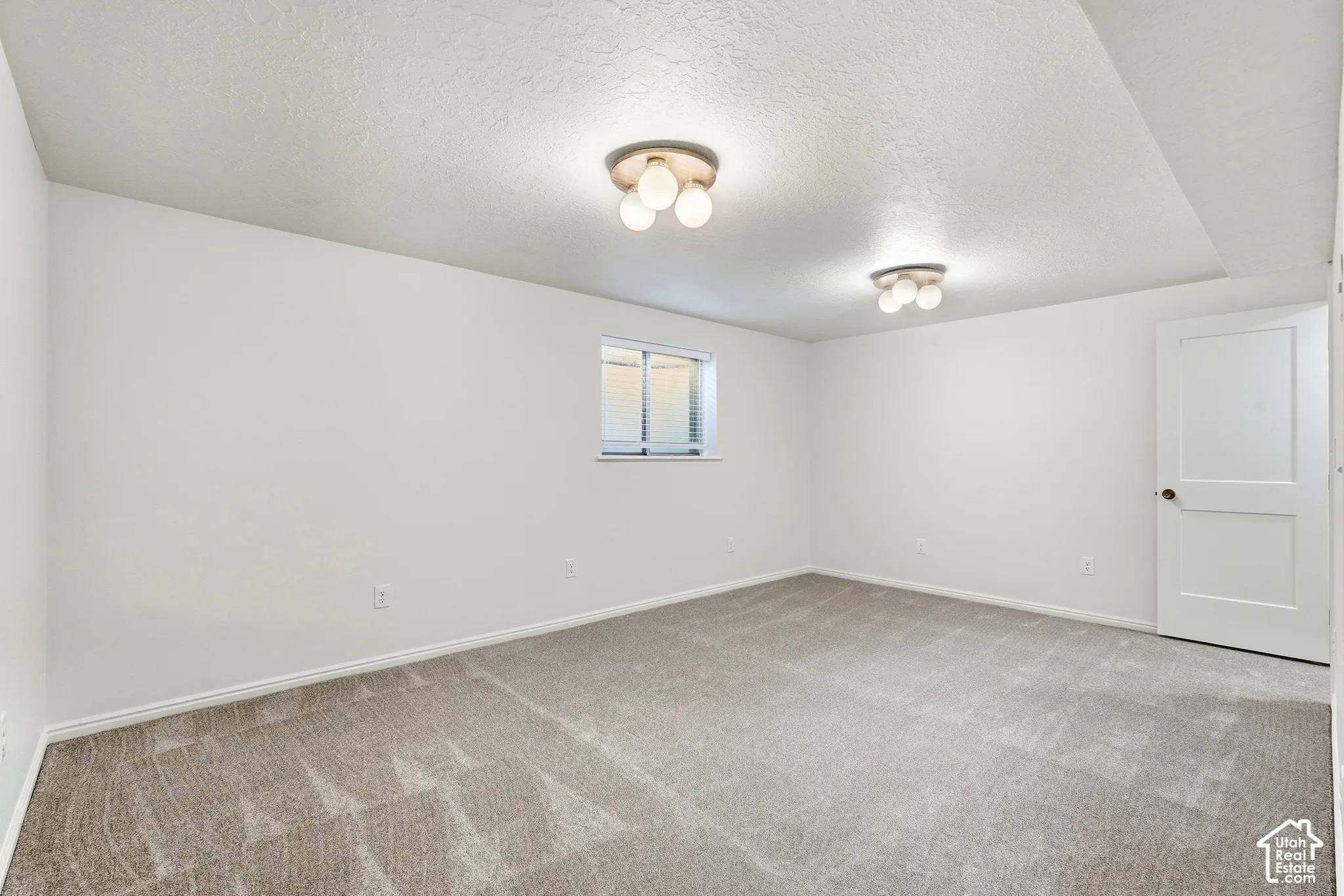 Neutral-toned carpeting throughout