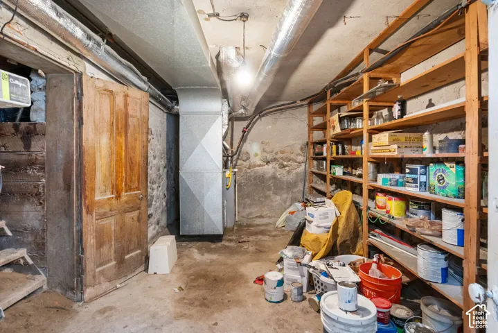 Concrete flooring with exposed ductwork and utility infrastructure