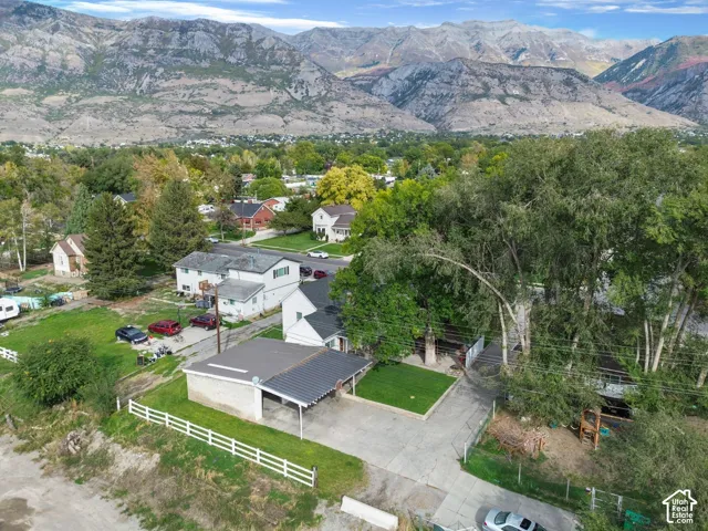 Expansive mountain backdrop with a residential setting