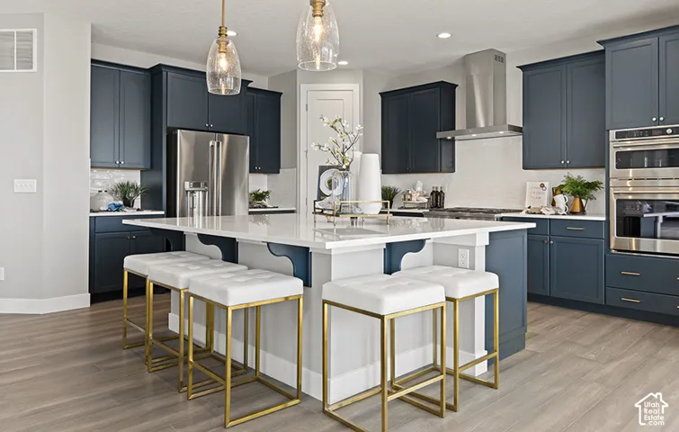HOME TO BE BUILT! Pictures are of another similar Spec and not of this exact home. Colors and other options may vary from those seen here. Please see Sales consultant for details. Central kitchen island shown with white countertop, dark blue cabinetry, wo