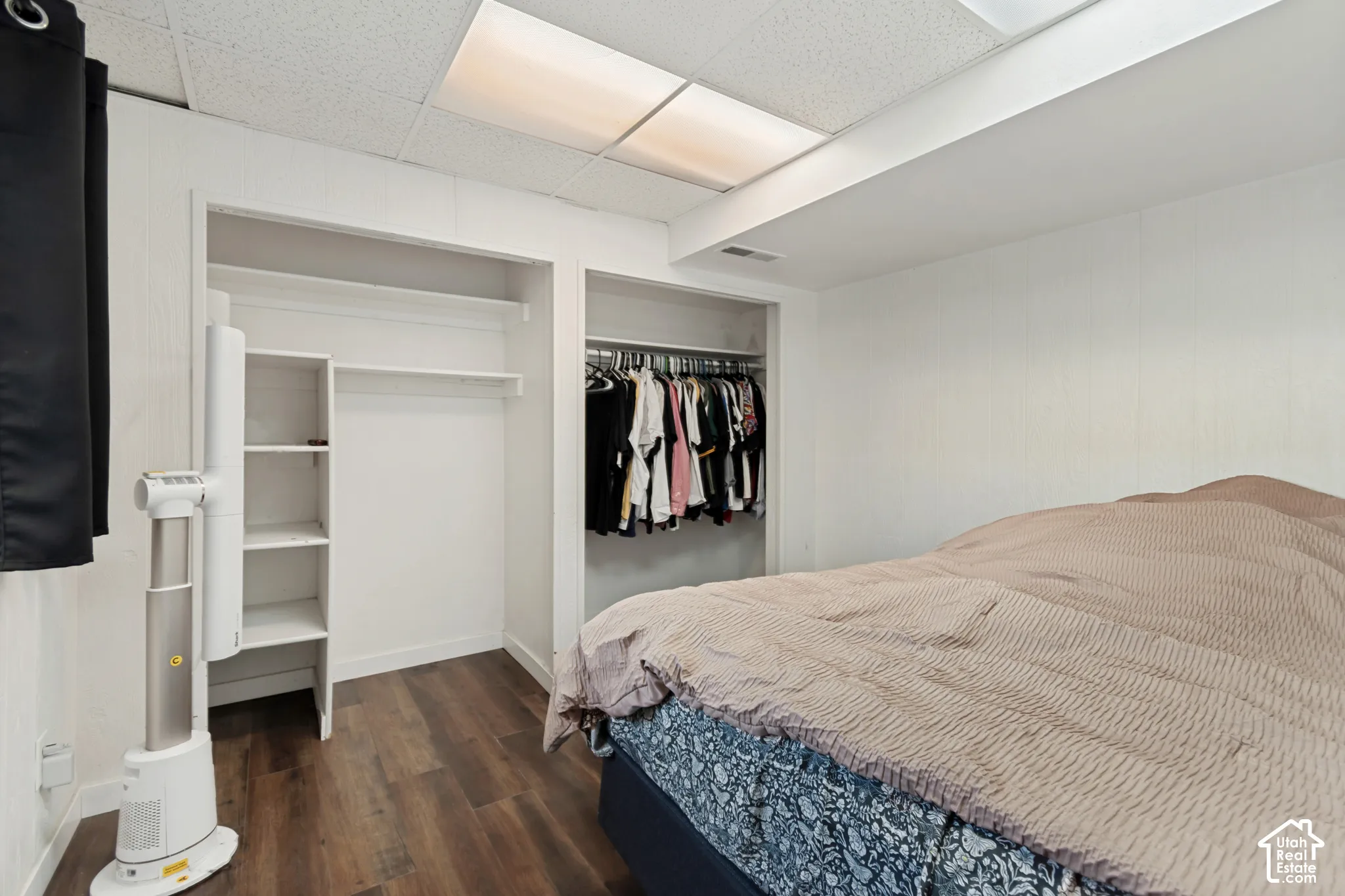 Recessed lighting, wood-finish flooring, and built-in closet shelving