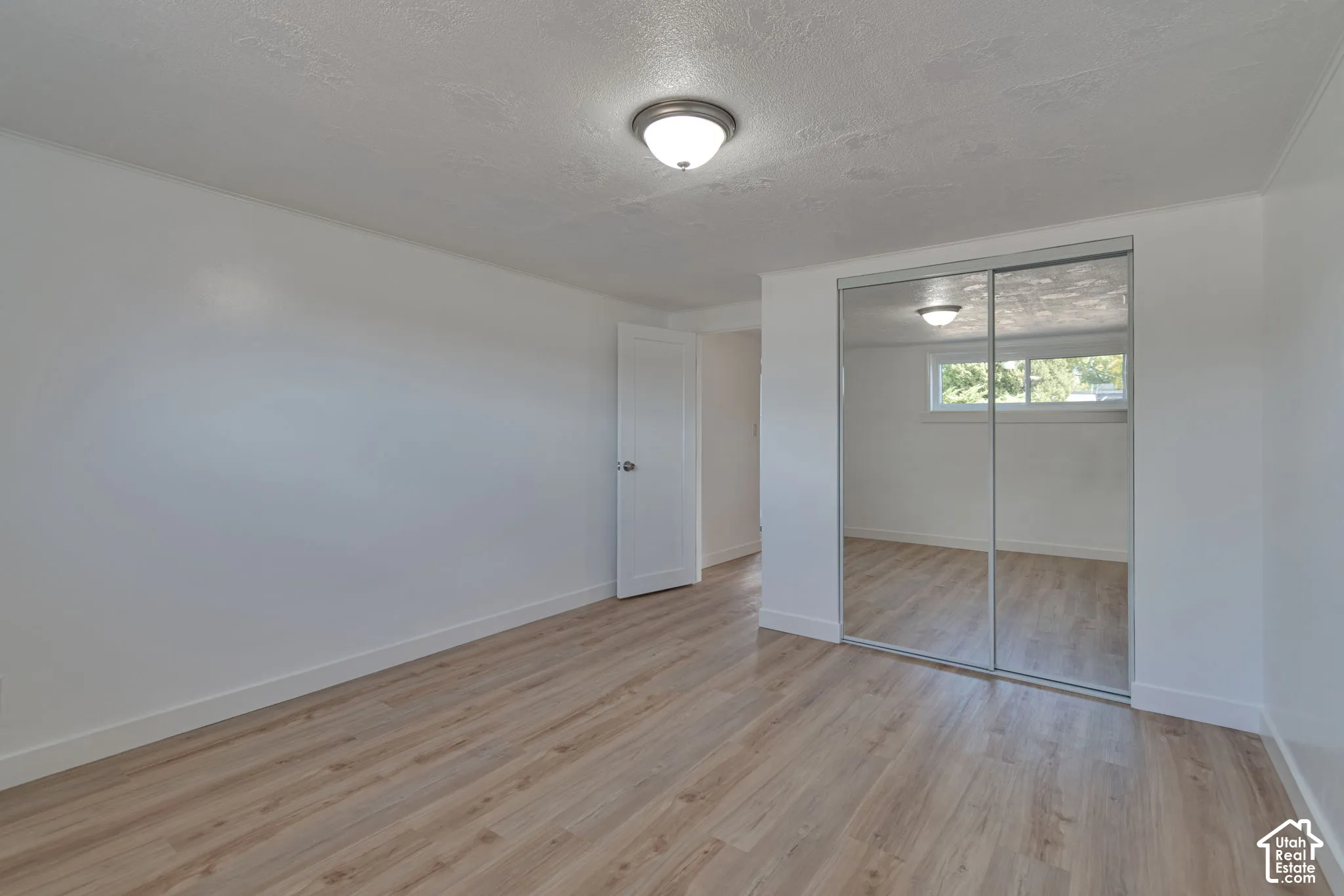 Wood-finish flooring with white trim