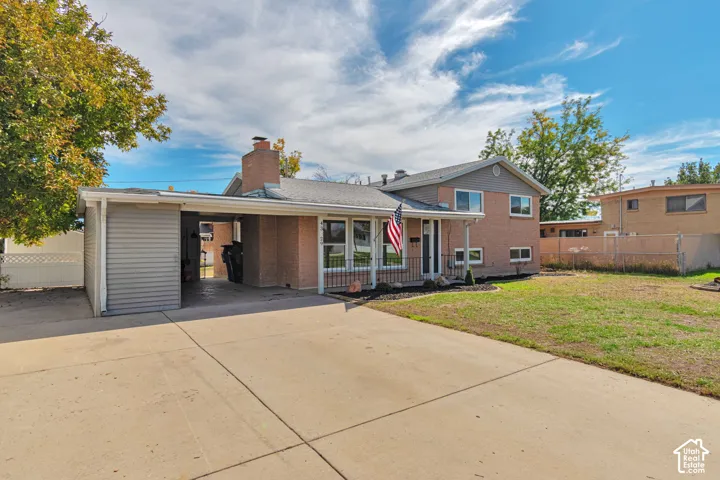 Brick and siding exterior with a covered front entry