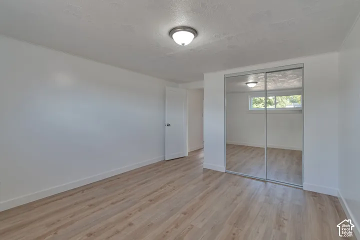 Wood-finish flooring with white trim
