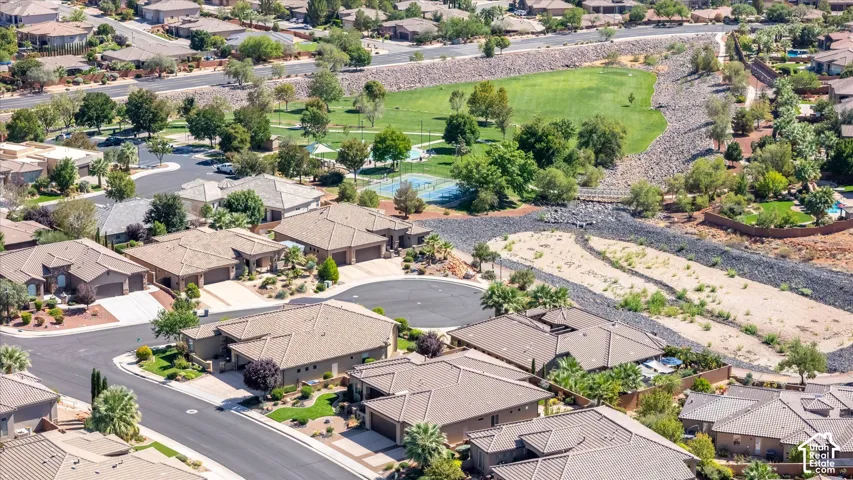 Residential neighborhood featuring cul-de-sac streets, mature trees, and landscaping