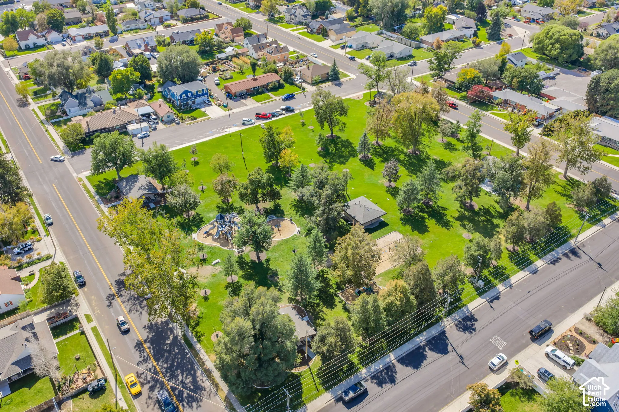 Expansive park and playground across the street and down 1 block