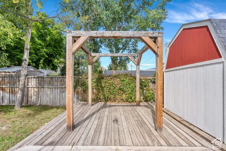 Wood deck with a built-in pergola frame