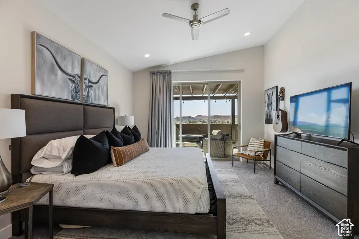 Vaulted ceiling with recessed lighting and ceiling fan