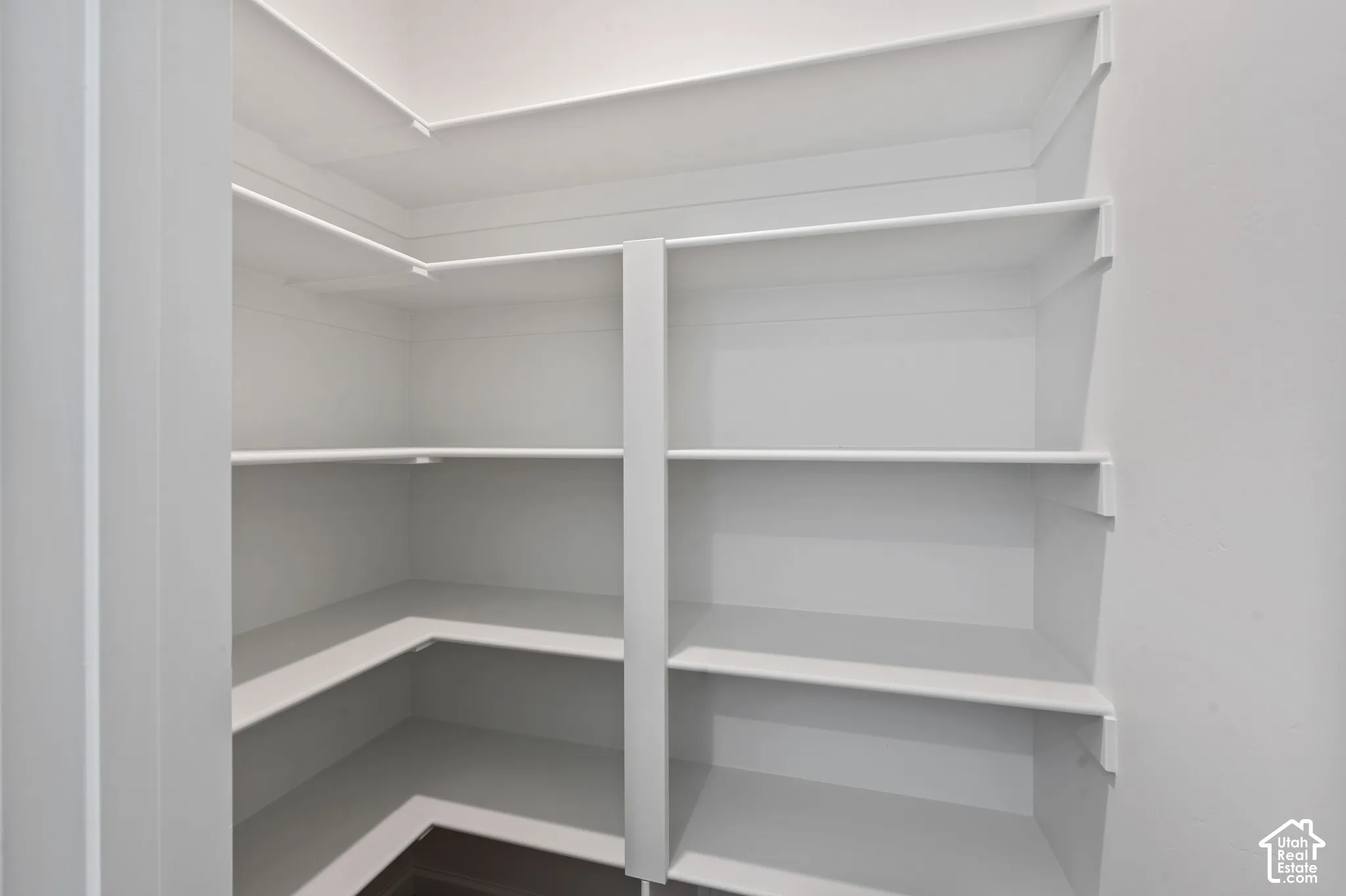 Large walk in pantry. Picture from another model and for example only.