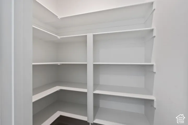 Large walk in pantry. Picture from another model and for example only.