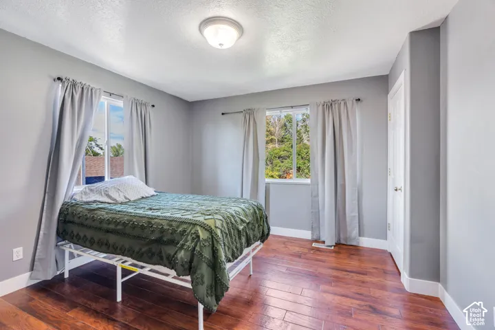 Hardwood-finish flooring, two windows, built-in closet