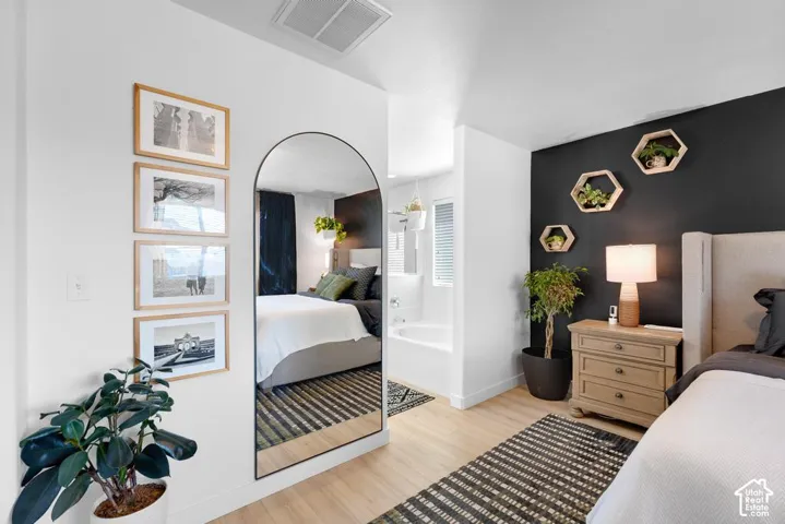 Wood-finish flooring with a textured area rug