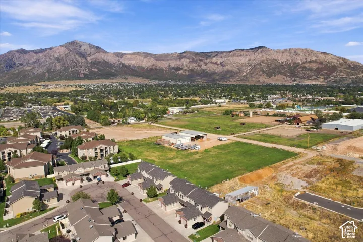 Expansive mountain backdrop with a developed residential area