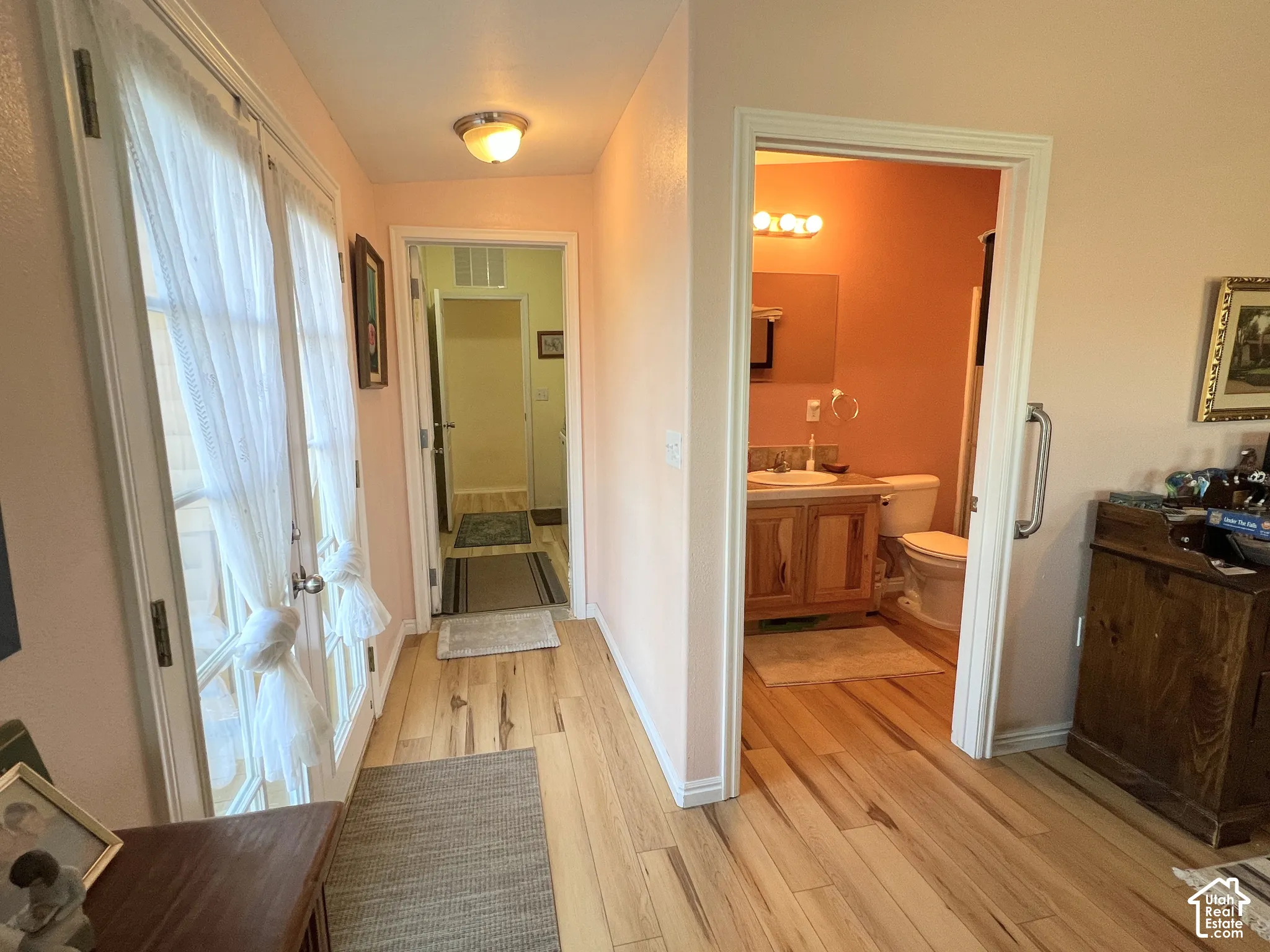 Wood-finish flooring throughout