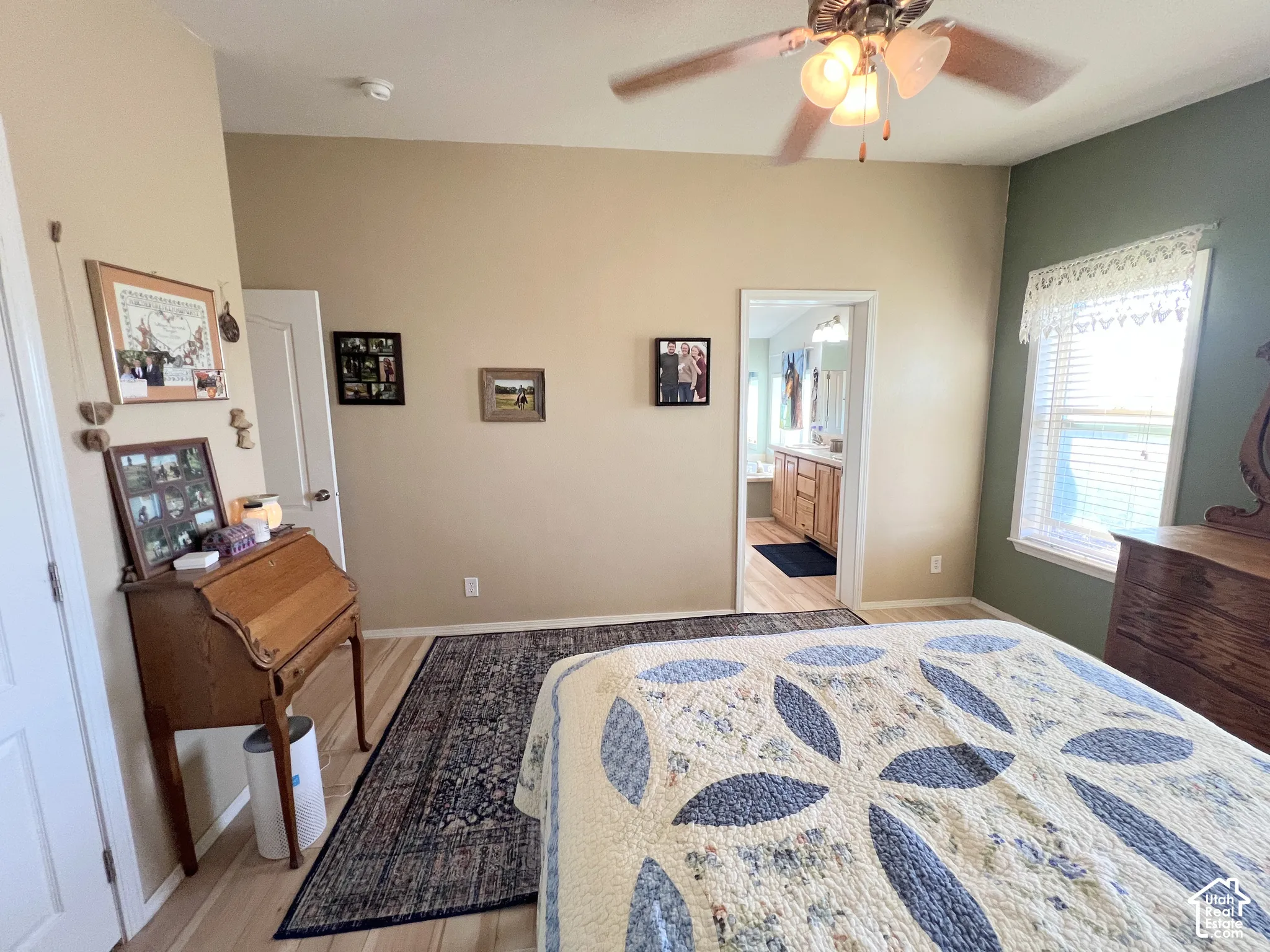Wood-finish flooring with a decorative area rug