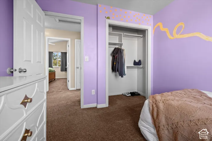 Built-in closet with shelving and hanging rods