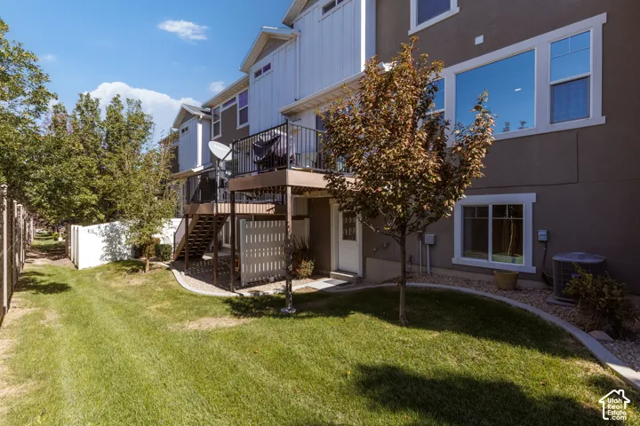 Private exterior deck with dark railings