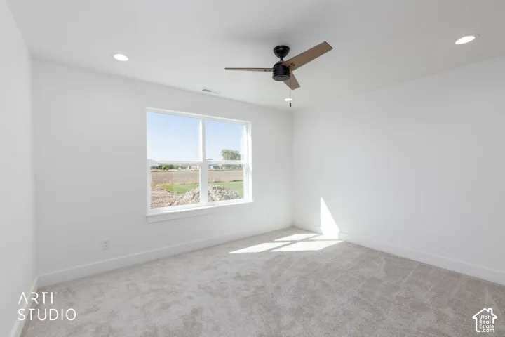 Primary Bedroom featuring recessed lighting, a ceiling fan, and carpeted flooring