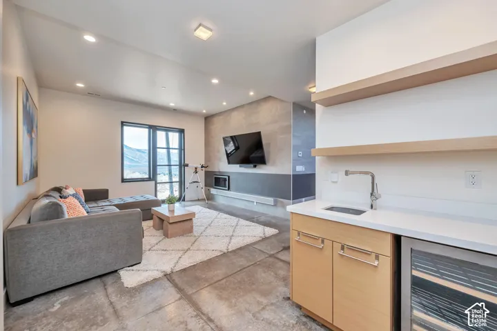 Concrete flooring throughout with recessed lighting