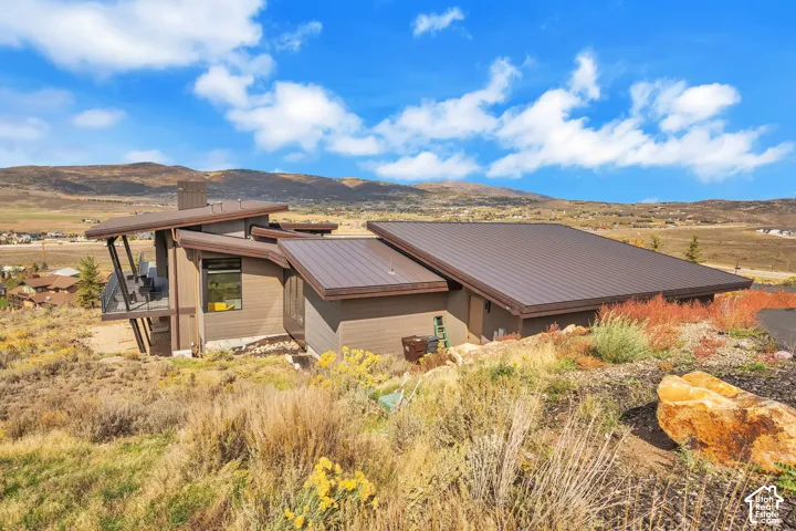 Contemporary architecture with a brown metal roof