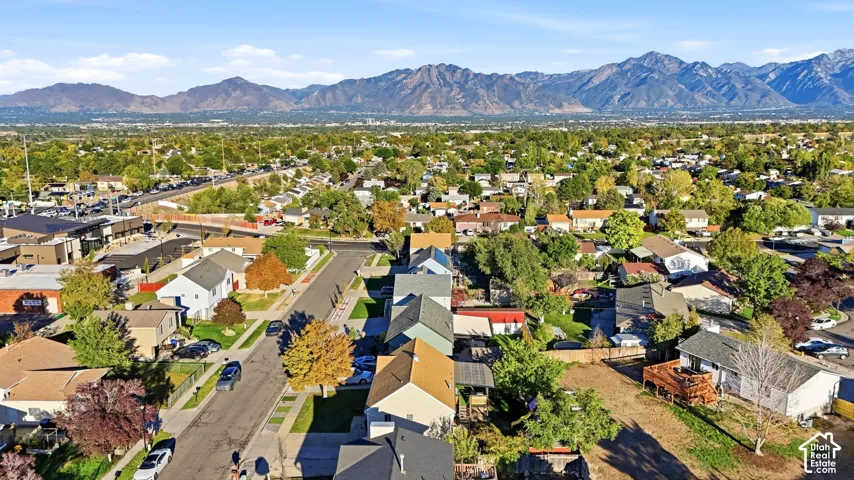Expansive neighborhood setting with established residential properties and mature trees