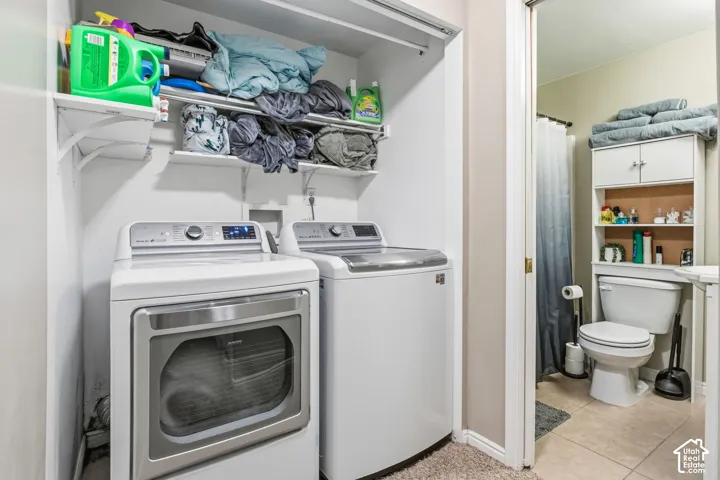 In-unit laundry machines with overhead shelving