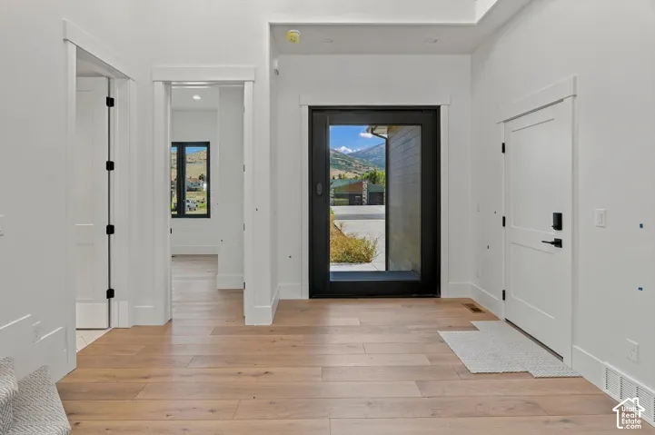 Wood-finish flooring throughout the space