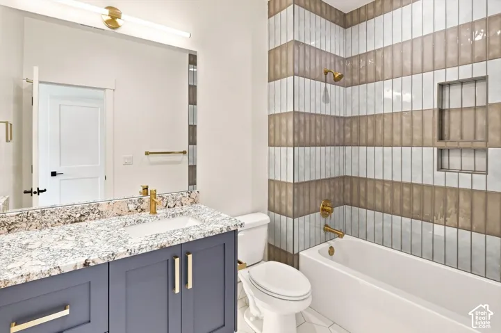 Modern vanity with a granite-style countertop and undermount sink