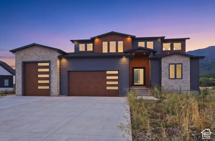 Modern architectural design featuring stacked stone and horizontal siding