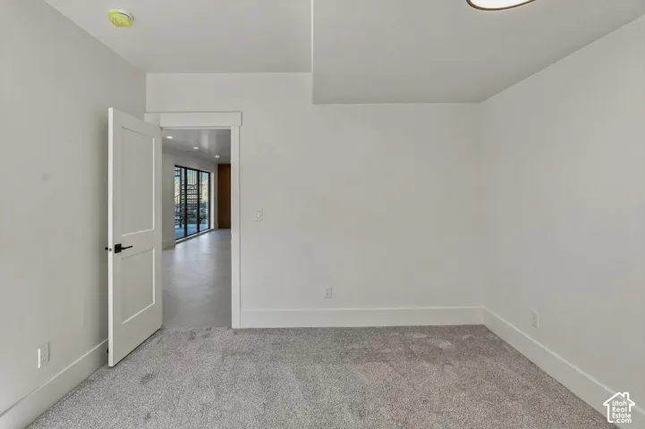 Light gray carpeting with white walls and trim