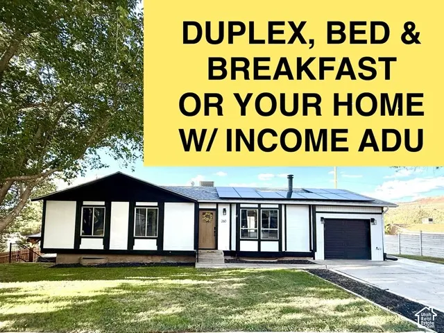 Featuring a property with a text overlay indicating potential uses including duplex, bed and breakfast, or a residence with an accessory dwelling unit