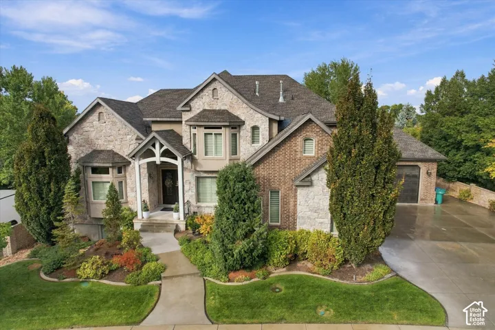 Stone and brick facade with multiple gables