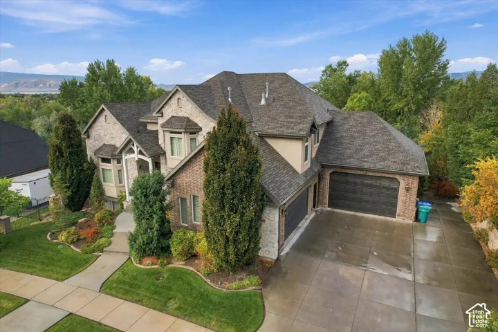 Brick and stone exterior with a multi-gabled roof