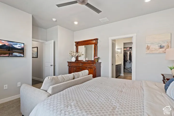 Recessed lighting, ceiling fan, and light gray walls
