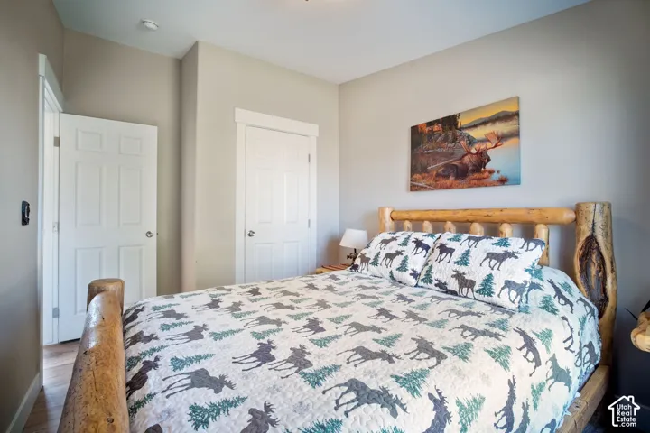 Light-toned walls complement the wood-finish flooring