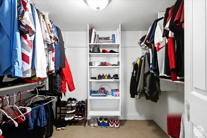 Built-in shelving and hanging rods provide ample storage