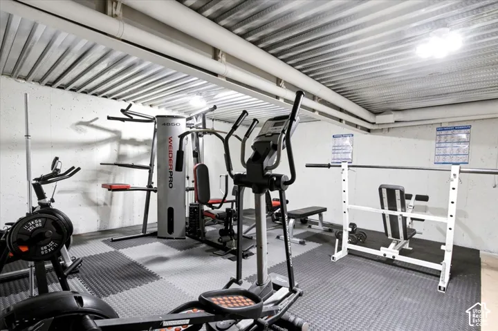 Dedicated fitness area featuring durable interlocking floor tiles