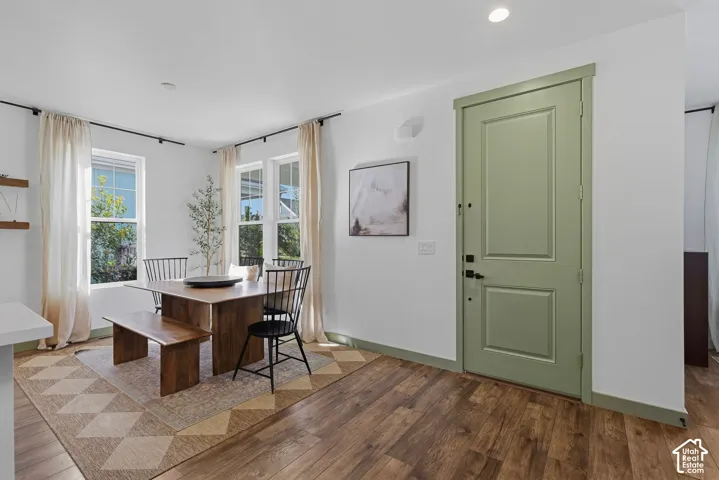 Wood-finish flooring, recessed lighting, spacious breakfast area, convenient to the kitchen and office