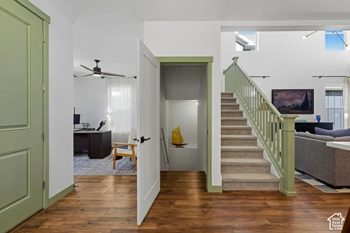 Wood-finish flooring throughout the main level. Stairway to second level and basement.