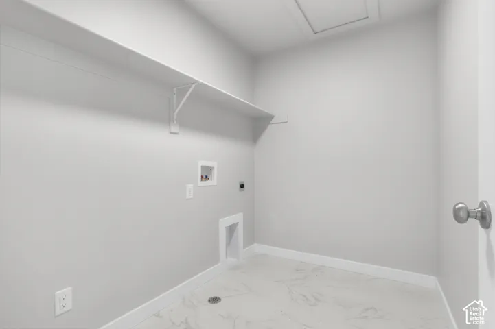 White wall shelving with support brackets, white wall paint, and white baseboards