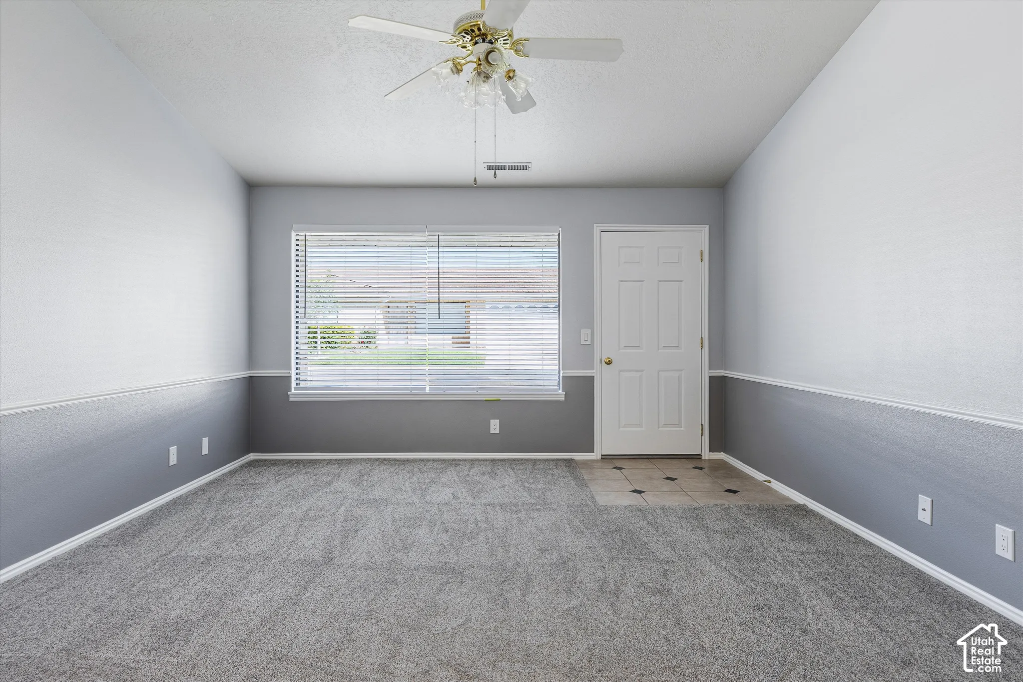 Living Area with Fresh Paint and Carpet