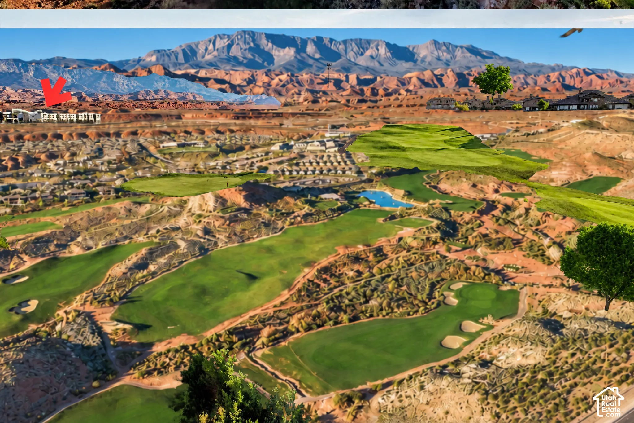 Expansive golf course setting featuring multiple greens, sand traps, and water features