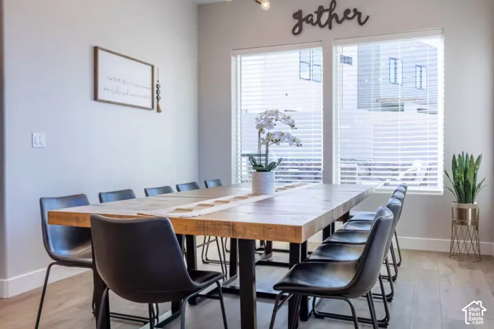 Wood-finish flooring with neutral wall tones and white trim