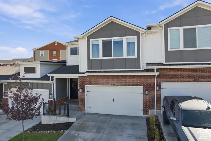 Brick and siding exterior with multiple windows