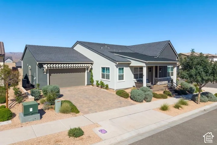 Contemporary exterior with a covered porch