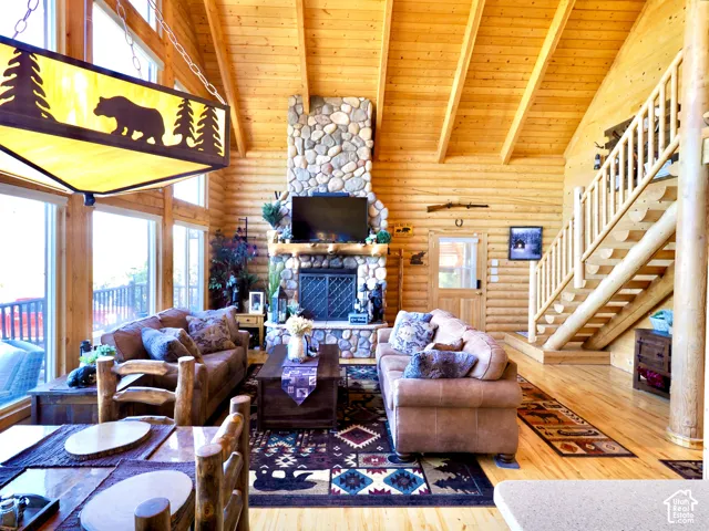 Vaulted wood-finish ceilings, wood-finish walls, and wood-finish flooring throughout