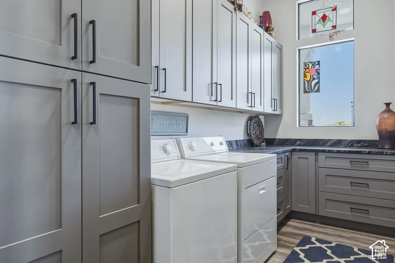 Laundry room with abundant storage