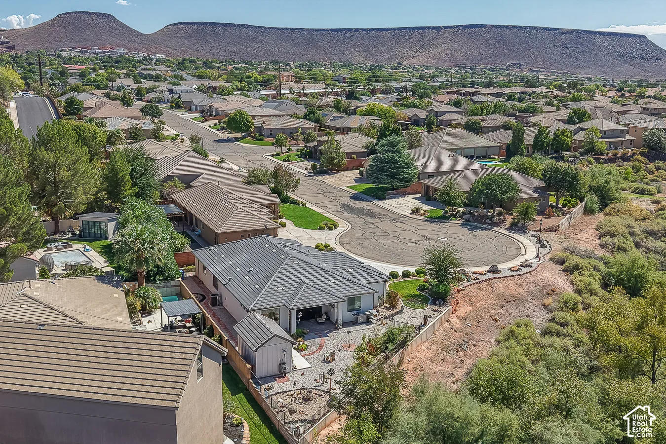 Aerial view of backyard and neighborhood