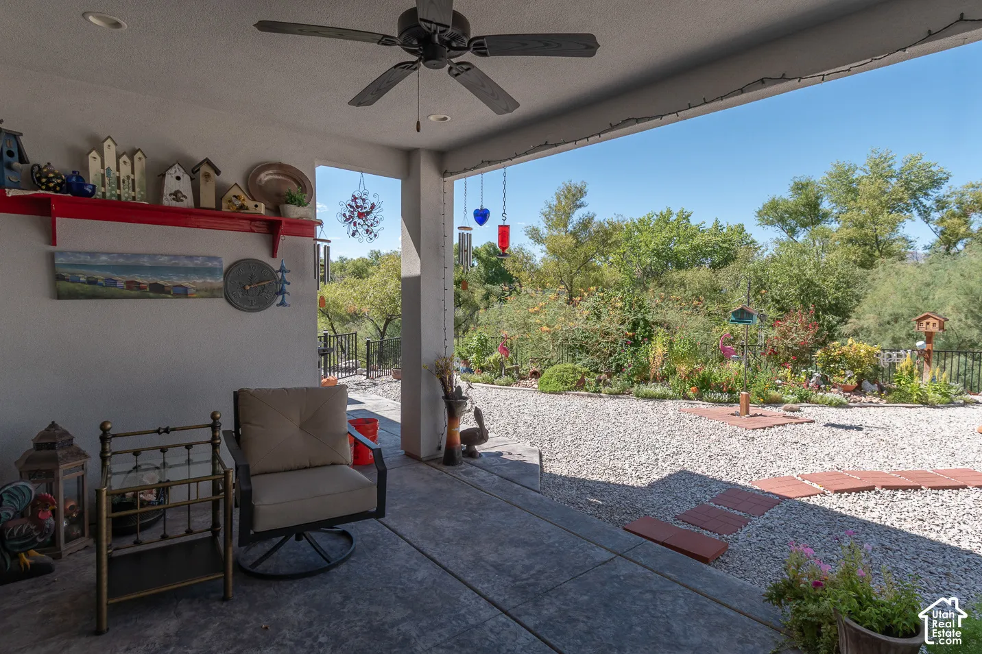 Covered back patio with ceiling fan